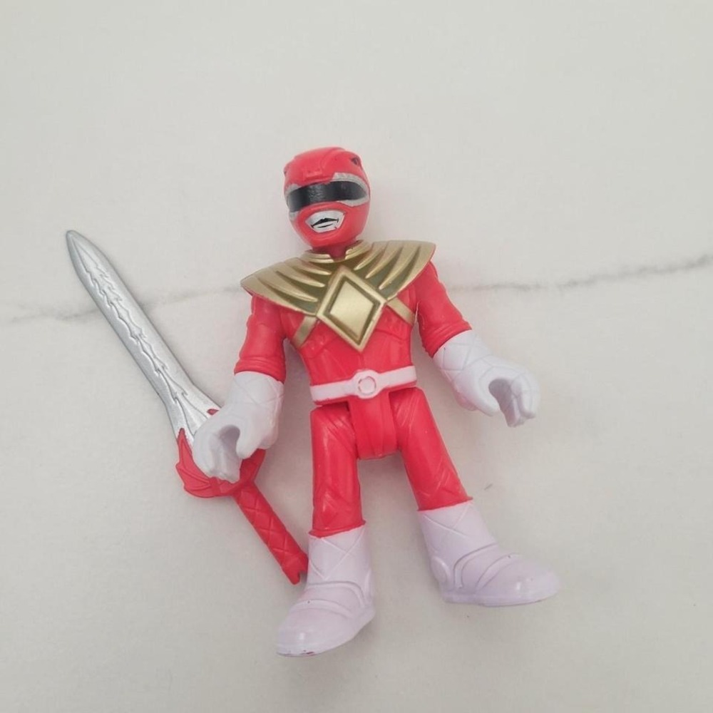 Red and gold Power Rangers action figure